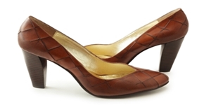 Close up of brown shoes isolated on white